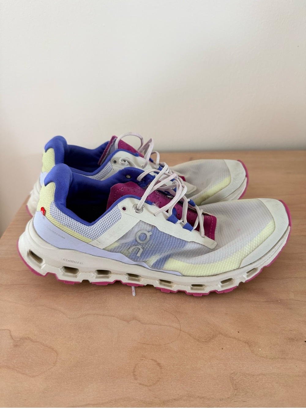 On Running Women's Lightweight Trainers in White, Yellow & Purple Accents